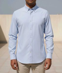 Long-sleeve polo shirt with a button-down collar.