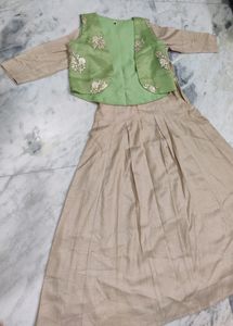cream gown with mint green jacket