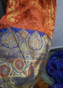 Orange &amp; Gold Lehenga Choli with Maggam work