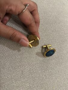 Blue cufflinks with golden border