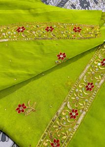 Green Embroidered Saree with red contrast blouse