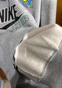 NIKE AIR LIGHT GREY MARL GRAPHIC HOODIE L(42)