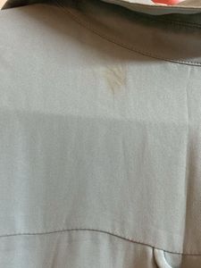 Light Blue Sleeveless Button-Down