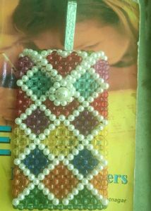 Multicoloured pearls bag