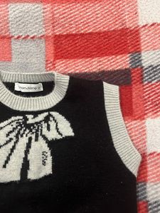 Black Sweater Vest