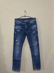 Distressed Denim Jeans