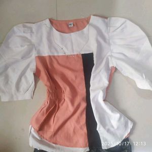 Puffed shoulder side cinched waist top