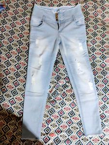 High-Waisted Distressed Jeans