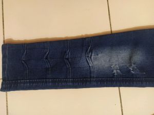 Skinny Blue Jeans With Distressed Pattern