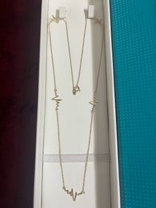 Authentic 18 CRT Gold Heartbeat Necklace