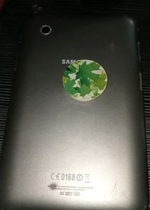 Samsung Galaxy Tablet With Blue Cover And Charger