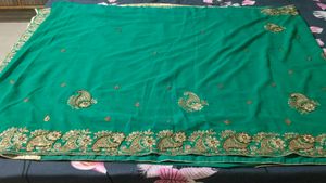 Elegant rama colour Embroidered Saree