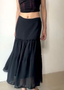 Black Ruffle Skirt With Some Design Down