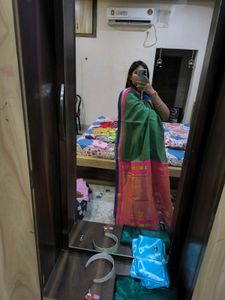Green saree with multicolour details and glitter s
