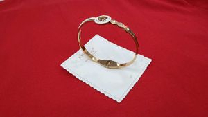 Gold Tone Bangle Bracelet