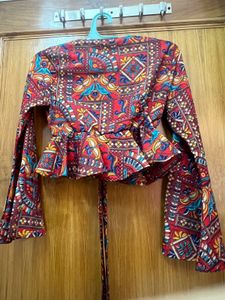 A Cropped Peplum Style Top