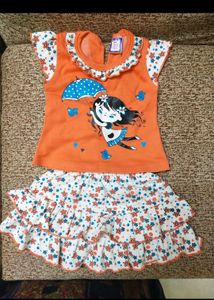 Baby Frocks And Rocker Chair