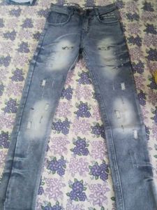 Distressed Denim Jeans