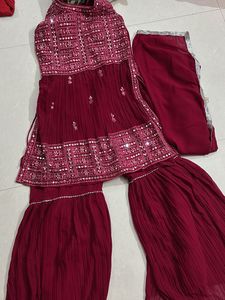 Red Mirror work lehanga with flared bottom and net