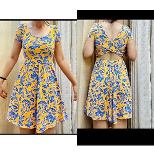 Forever 21. Floral Yellow Back Criss Cross  Dress
