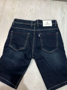 Distressed Denim Shorts