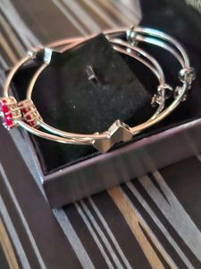 Silver Jhumka Earrings and bracelets