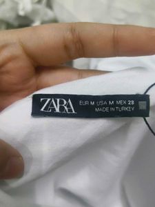 White Sleeveless Bodysuit