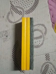 Yellow Wooden Block. Black board duster