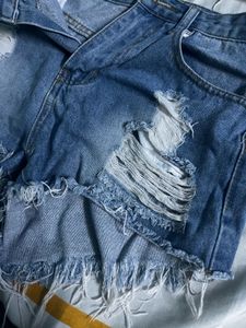 blue ripped shorts