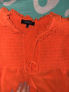 Orange Smocked Ruffle Tank