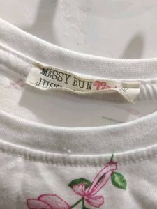A Crop Top With Bows On It