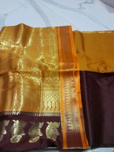 # Party Wear Maroon Silk Saree Golden Border.