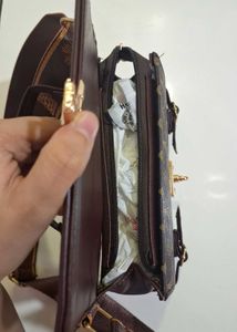 Brown patterned Crossbody Bag