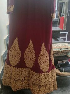 Elegant Maroon Embroidered Saree