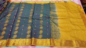 Elegant Teal & Gold Floral Saree