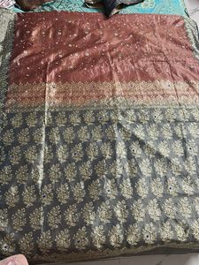 Elegant Bronze Saree with Detailed Border