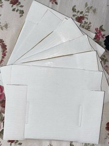 white packaging boxes with accesories display card