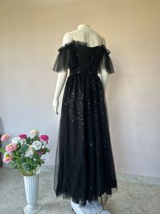 Black sequined Lux gown