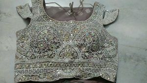 Elegant Pastel Lehenga with Intricate Embroidery a