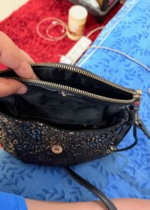 Black And Golden Juicy Couture Sling Bag