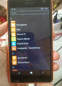 Microsoft Lumia 535, along with the charger