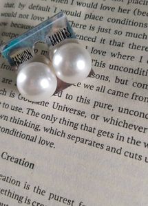 pearl stud earrings.