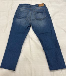 Distressed Denim Jeans