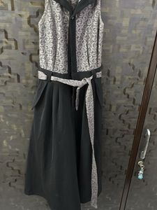 Patterned Sleeveless Jumpsuit with Belt