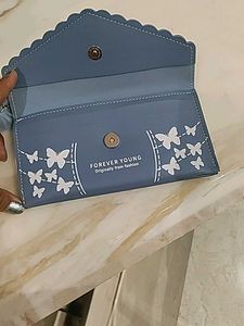 Clutch And Mobile Holder