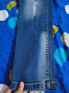 Distressed Denim Jeans
