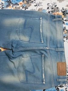 Ripped Jeans - Light Wash Denim