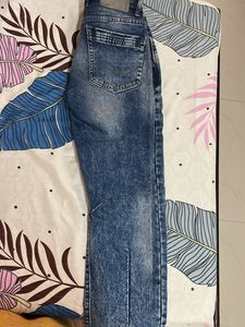 Distressed Denim Jeans
