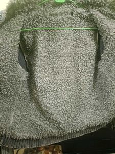 Denim Jacket with Knit Sleeves