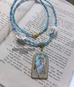 Angel By The Window Clay Pendant Blue Necklace
